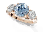 Round Three Stone Engagement Ring Setting for a Fancy Blue Lab-Grown Diamond | Tapered Pave Band | Rose Gold