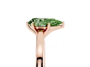 Fancy Green Pear Cut Diamond Solitaire Engagement Ring Set in Rose gold with Prong Setting on a Classic Band