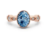 Fancy Blue Oval Cut Diamond Vintage-Inspired Milgrain Ring Set in Rose gold with Marquise Stations of Round Accents