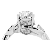 Pear Cut Diamond Solitaire Twist Engagement Ring Set in Silver with Pavé Leaf Accents
