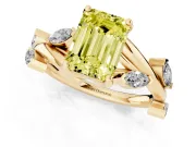 Fancy Yellow Emerald Cut Diamond Solitaire Ring Set in Yellow gold with Twisted Marquise Accent Band