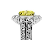 Fancy Yellow Radiant Cut Diamond Halo Engagement Ring Set in White gold with Split Shank and Prong Setting