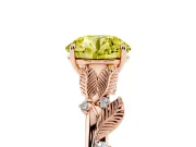 Fancy Yellow Round Cut Diamond Solitaire Ring Set in Rose gold with Leaf Motif Band