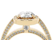 Oval Cut Diamond Halo Pavé Split Shank Ring Set in Yellow gold with Prong Setting
