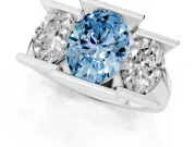 Fancy Blue Oval Cut Diamond Three-Stone Channel Set Ring Set in Platinum with Smooth Polished Band