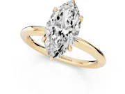 Marquise Cut Diamond Solitaire Ring Set in Yellow gold with Thin Band and Prong Setting