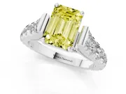 Fancy Yellow Emerald Cut Diamond Classic Solitaire Ring Set in White gold with Pavé Band and Prong Setting