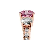 Fancy Pink Cushion Cut Diamond Three-Stone Ring Set in Rose gold with Round Side Stones and Pavé Band