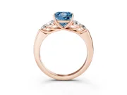 Fancy Blue Princess Cut Diamond Cluster Ring Set in Rose gold with Round Accent Stones and Prong Setting on a Plain Band