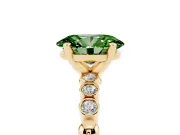 Fancy Green Oval Cut Diamond Solitaire Engagement Ring Set in Yellow gold with Bezel Accents on Beaded Band