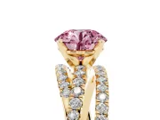 Fancy Pink Round Cut Diamond Solitaire Twist Band Ring Set in Yellow gold with Pavé Setting and Prong Head