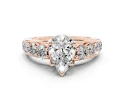 Pear-Shaped Graduated Side Stone Engagement Ring Setting | Shared Prong Rails | Rose Gold