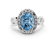 Fancy Blue Oval Cut Diamond Halo Ring Set in Silver with Scrollwork Band and Prong Setting