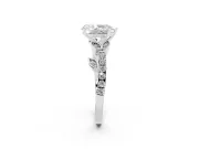 Pear Cut Diamond Solitaire Leaf-Inspired Ring Set in Platinum with Pavé Band and Prong Setting