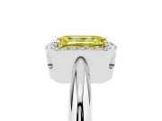 Fancy Yellow Emerald Cut Diamond Halo Engagement Ring Set in White gold with Plain Split Shank and Prong Setting