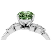 Fancy Green Oval Cut Diamond Solitaire Ring Set in Platinum with Marquise Twist Band and Prong Setting