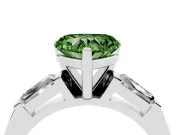 Fancy Green Heart Cut Diamond Solitaire Ring Set in Platinum with Tapered Baguette Side Stones and Prong Setting