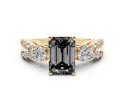 Fancy Black Emerald Cut Diamond Three-Stone Ring Set in Yellow gold with Pavé Split Shank and Prong Setting