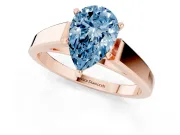 Fancy Blue Pear Cut Diamond Solitaire Engagement Ring Set in Rose gold with Prong Setting and Tapered Band