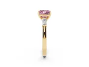 Fancy Pink Princess Cut Diamond Solitaire Ring Set in Yellow gold with Tapered Baguette Side Stones and Prong Setting