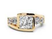 Princess Cut Diamond Bezel Bypass Ring Set in Yellow gold with Round Accents