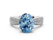 Fancy Blue Oval Cut Diamond Solitaire Ring Set in Platinum with Milgrain Double Row Round Pavé Band