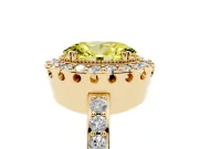 Fancy Yellow Oval Cut Diamond Halo Ring Set in Yellow gold with Pavé Shank and Prong Setting