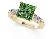 Fancy Green Princess Cut Diamond Solitaire Ring Set in Yellow gold with Tapered Baguette Side Stones and Prong Setting