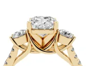 Three-Stone Cushion Cut Diamond Pavé Band Ring Set in Yellow gold with Prong-Set Trio