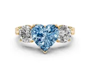 Fancy Blue Heart Cut Diamond Three-Stone Ring Set in Yellow gold with Milgrain Band