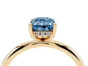 Fancy Blue Emerald Cut Diamond Solitaire Engagement Ring Set in Yellow gold with Prong Setting and Polished Band