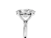 Oval Cut Diamond Solitaire Engagement Ring Set in Silver with Thin Band and Prong Setting
