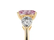 Fancy Pink Three-Stone Emerald Cut Diamond Ring Set in Yellow gold with Pear Side Stones and Prong Setting