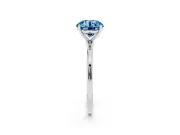 Fancy Blue Round Cut Diamond Solitaire Engagement Ring Set in Silver with Thin Band and Prong Setting