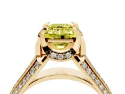 Fancy Yellow Emerald Cut Diamond Pavé Split Shank Solitaire Ring Set in Yellow gold with Prong Setting
