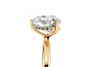 Heart Cut Diamond Solitaire Engagement Ring Set in Yellow gold with Prong Setting and Polished Band