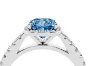 Fancy Blue Cushion Cut Diamond Halo Engagement Ring Set in White gold with Pavé Band and Prong Setting