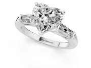 Heart Cut Diamond Solitaire Ring Set in Platinum with Tapered Baguette Side Stones and Prong Setting
