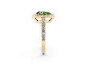Fancy Green Pear Cut Diamond Halo Pavé Engagement Ring Set in Yellow gold with Bezel Setting