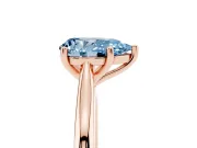 Fancy Blue Pear Cut Diamond Solitaire Ring Set in Rose gold with Cathedral Band and Prong Setting