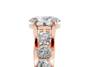 Oval Graduated Side Stone Engagement Ring Setting | Shared Prong Rails | Rose Gold