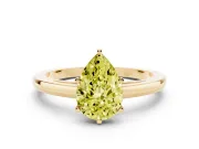 Fancy Yellow Pear Cut Diamond Solitaire Engagement Ring Set in Yellow gold with Prong Setting on a Classic Band