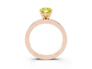 Fancy Yellow Cushion Cut Diamond Solitaire Ring Set in Rose gold with Channel-Set Baguette Band and Prong Setting