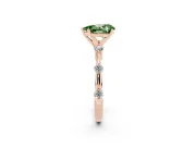 Fancy Green Pear Cut Diamond Solitaire Ring Set in Rose gold with Bezel Set Side Stones and Prong Setting