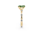 Fancy Green Pear Cut Diamond Solitaire Ring Set in Yellow gold with Bezel Set Side Stones and Prong Setting
