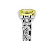 Fancy Yellow Emerald Cut Diamond Classic Solitaire Ring Set in White gold with Pavé Band and Prong Setting