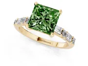 Fancy Green Princess Cut Diamond Solitaire Set in Yellow gold with Side Baguettes and Channel Set Band