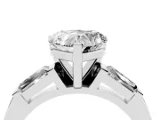 Heart Cut Diamond Solitaire Ring Set in Platinum with Tapered Baguette Side Stones and Prong Setting