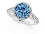 Fancy Blue Round Cut Diamond Halo Engagement Ring Set in White gold with Pavé Band and Prong Setting
