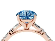 Fancy Blue Round Cut Diamond Solitaire Set in Rose gold with Side Baguettes and Channel Set Band